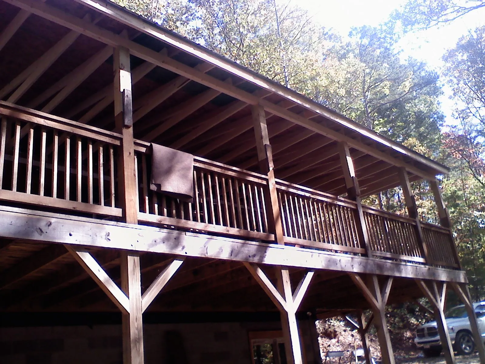 Timber framing under a new elevated porch and deck — Roof Leak Repair in Dunbarton by Roofing Brothers